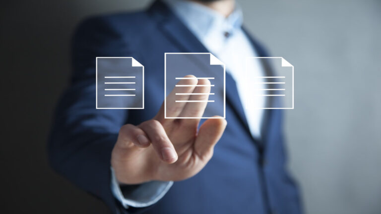 man touching file in screen